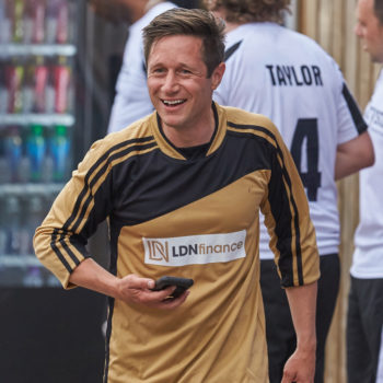 Founder playing a football game at the annual octane capital cup