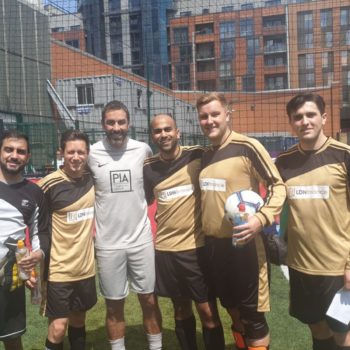 LDN Group playing a football game at the annual octane capital cup